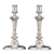 Stunning Rococo design distinguishes this pair of Georgian candlesticks