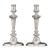 Stunning Rococo design distinguishes this pair of Georgian candlesticks