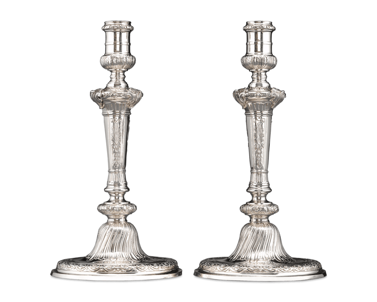 A well-balanced symphony of shells, palms, acanthus and rosettes adorns each piece