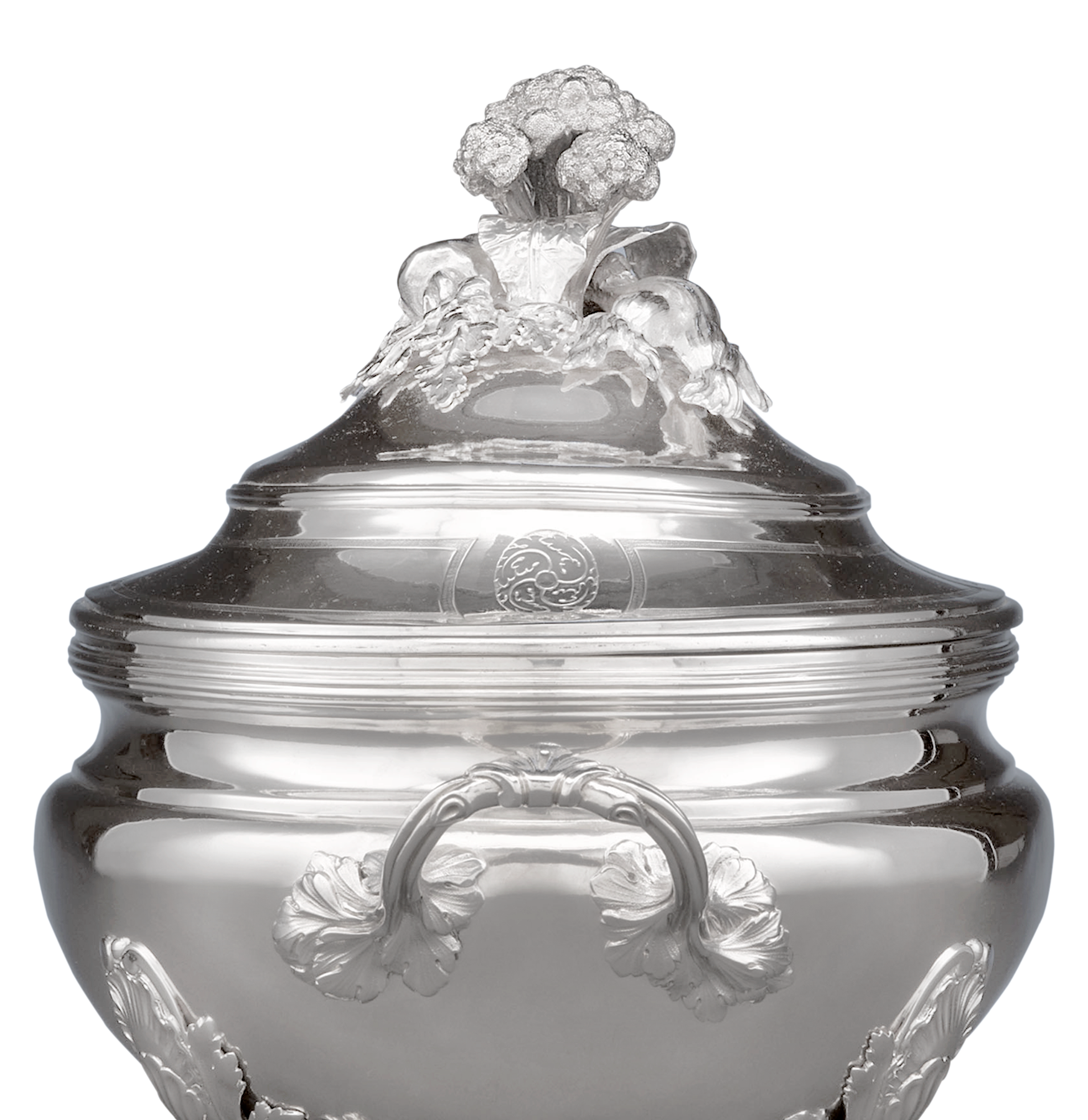 Foliate detailing at the handles and legs completes this superior design