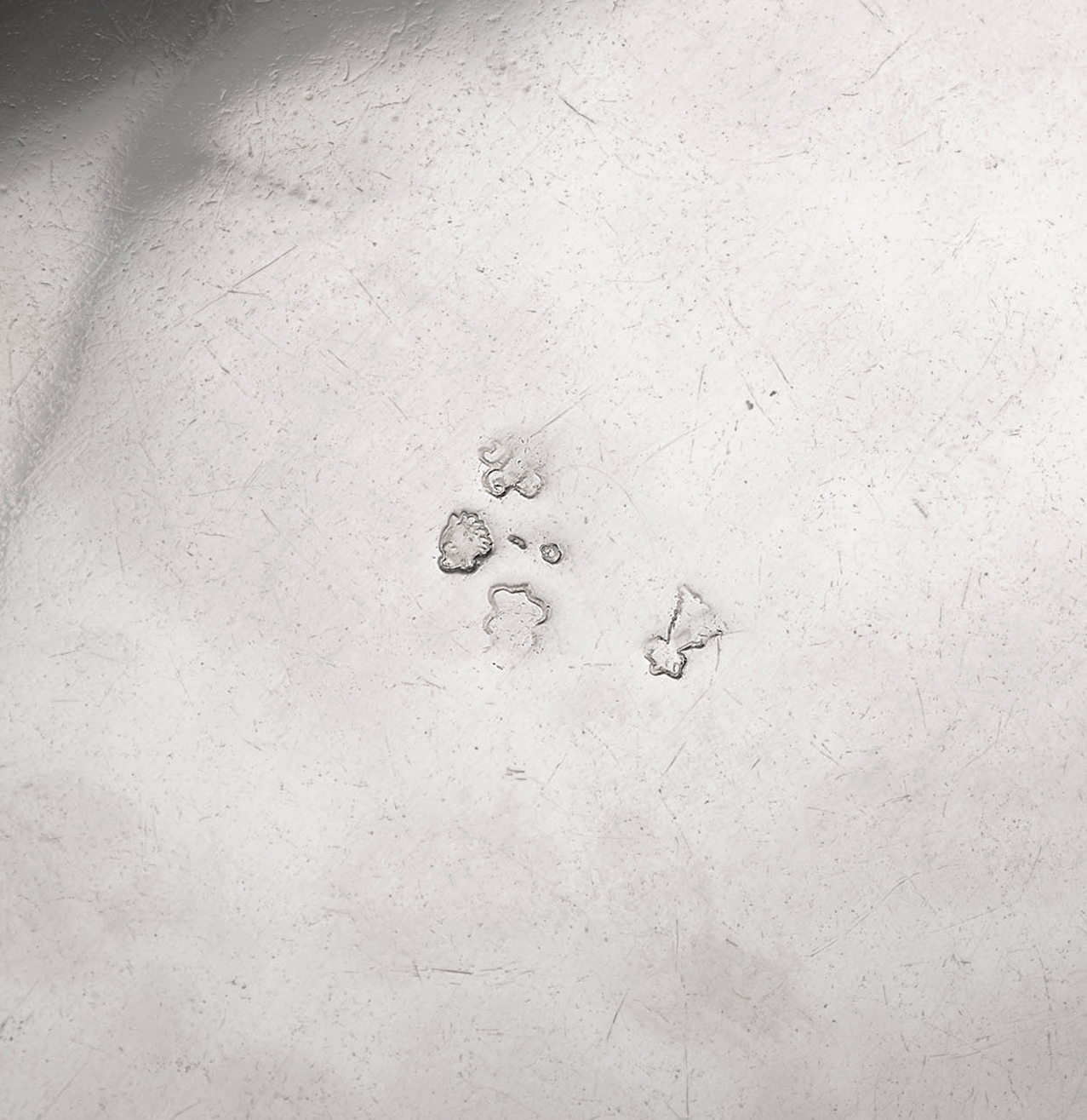 Hallmarks are stamped on the tureen's underside