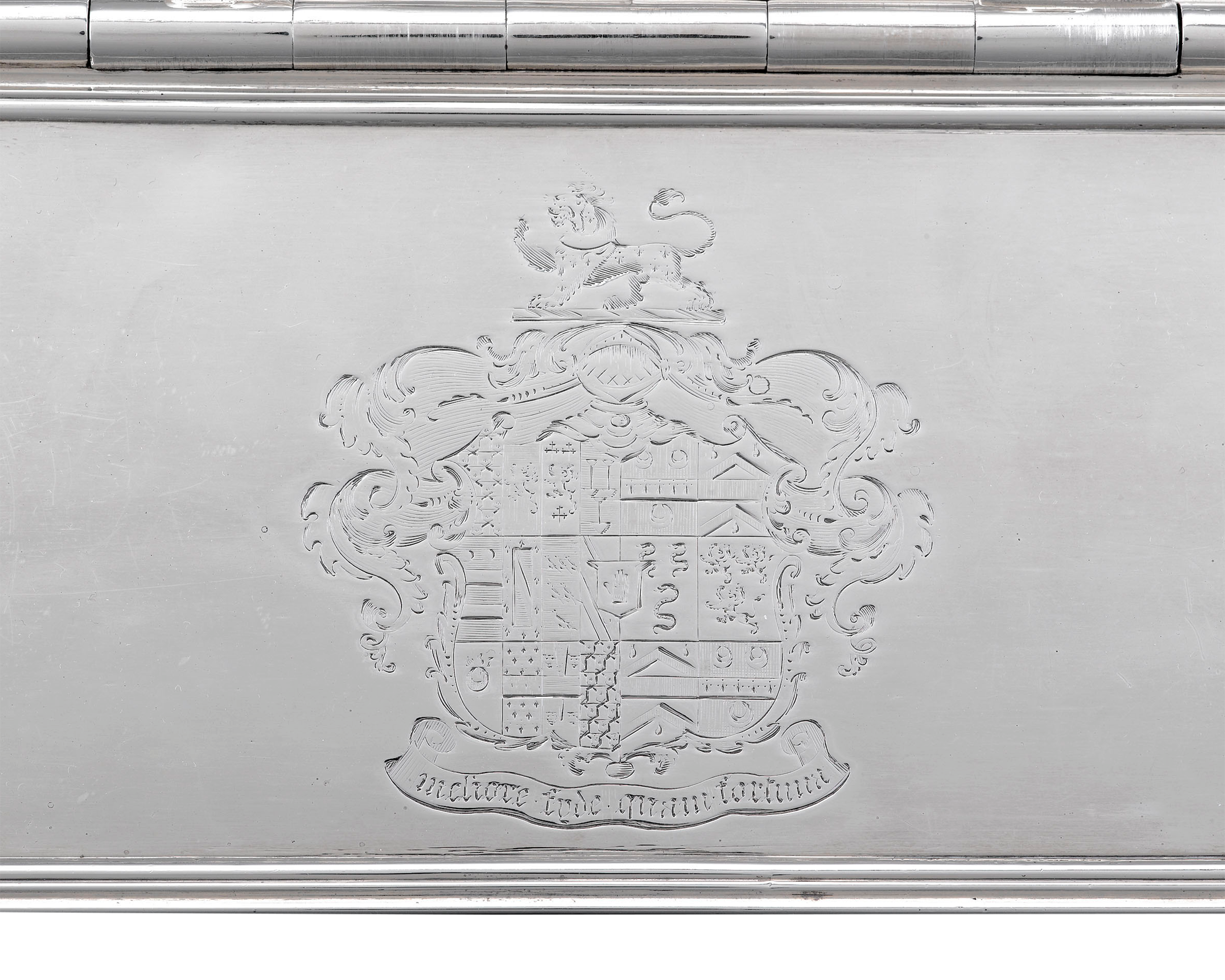 The coat of arms of the Greseley/Gresley family with their motto are clearly engraved