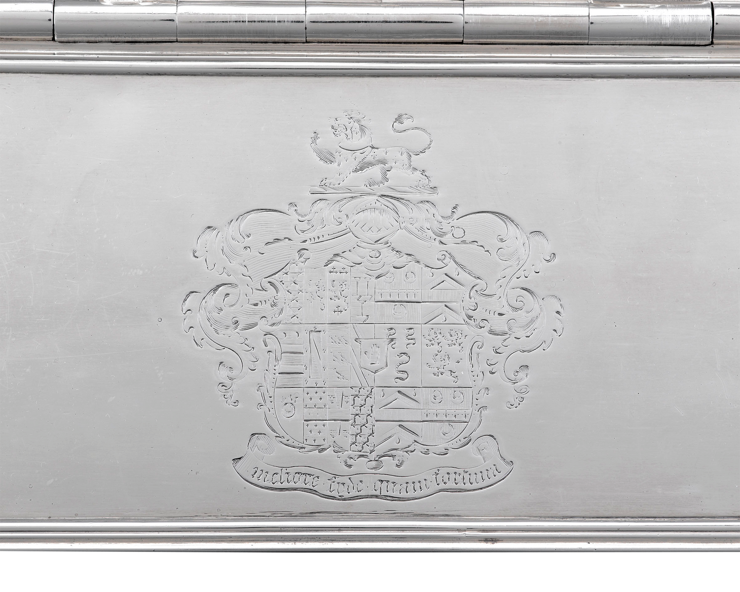 The coat of arms of the Greseley/Gresley family with their motto are clearly engraved