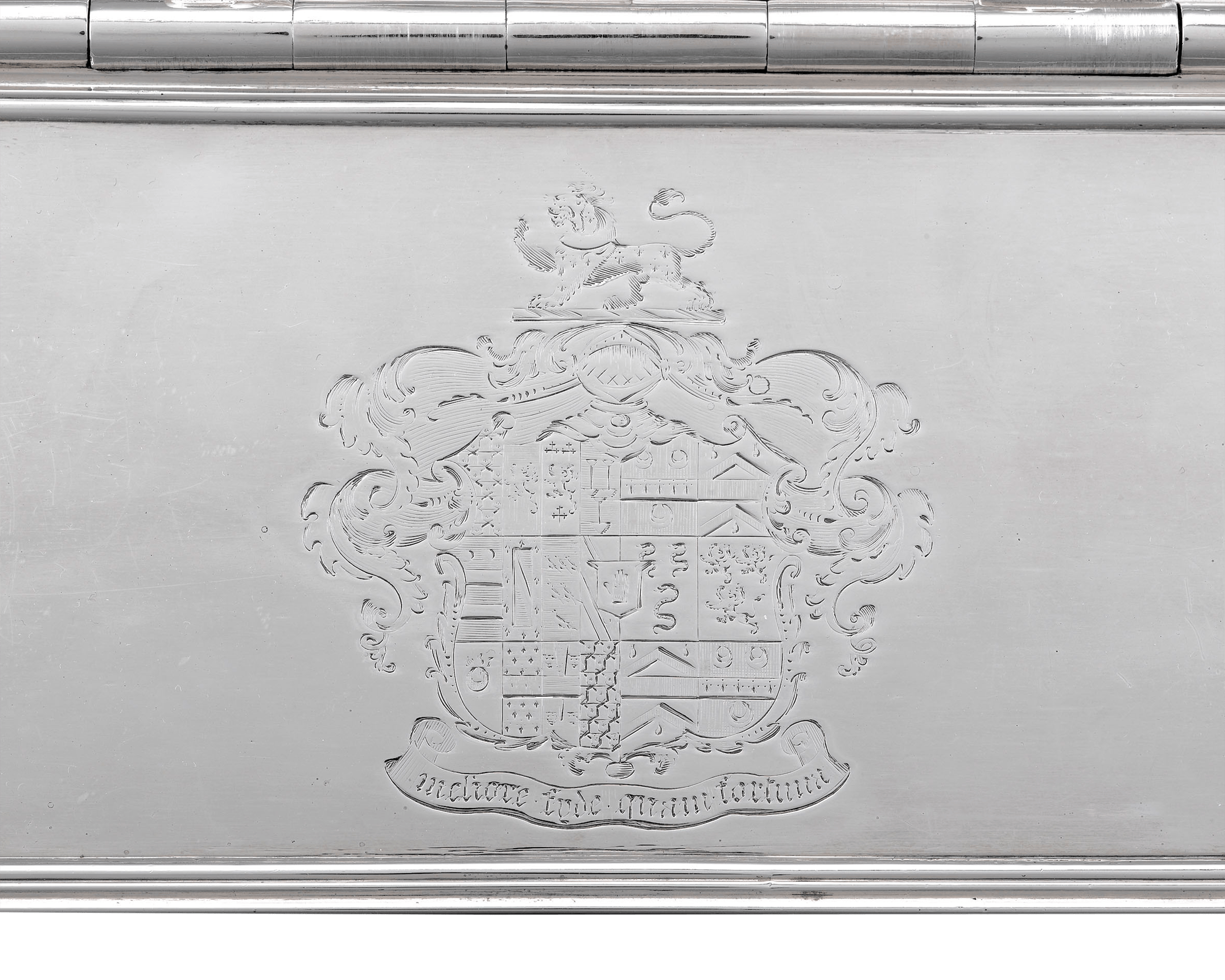 The coat of arms of the Greseley/Gresley family with their motto are clearly engraved