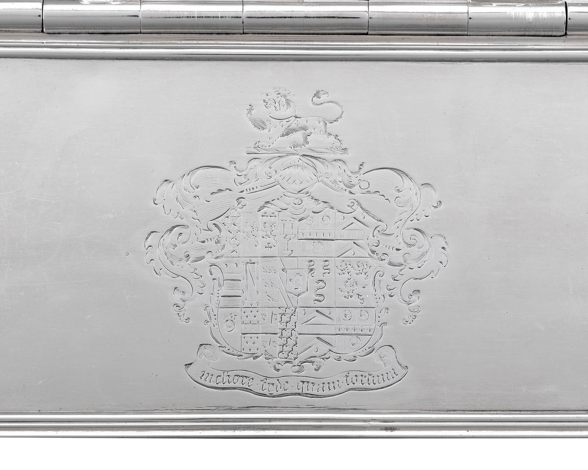 The coat of arms of the Greseley/Gresley family with their motto are clearly engraved