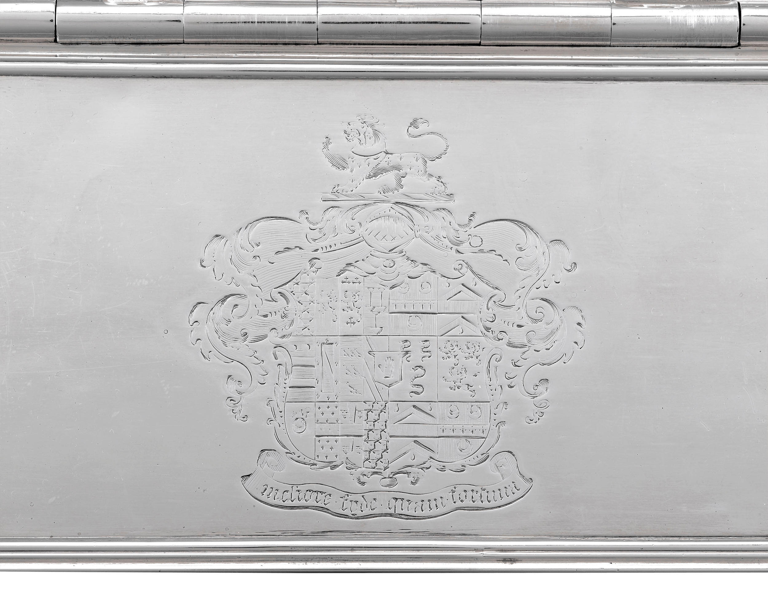 The coat of arms of the Greseley/Gresley family with their motto are clearly engraved