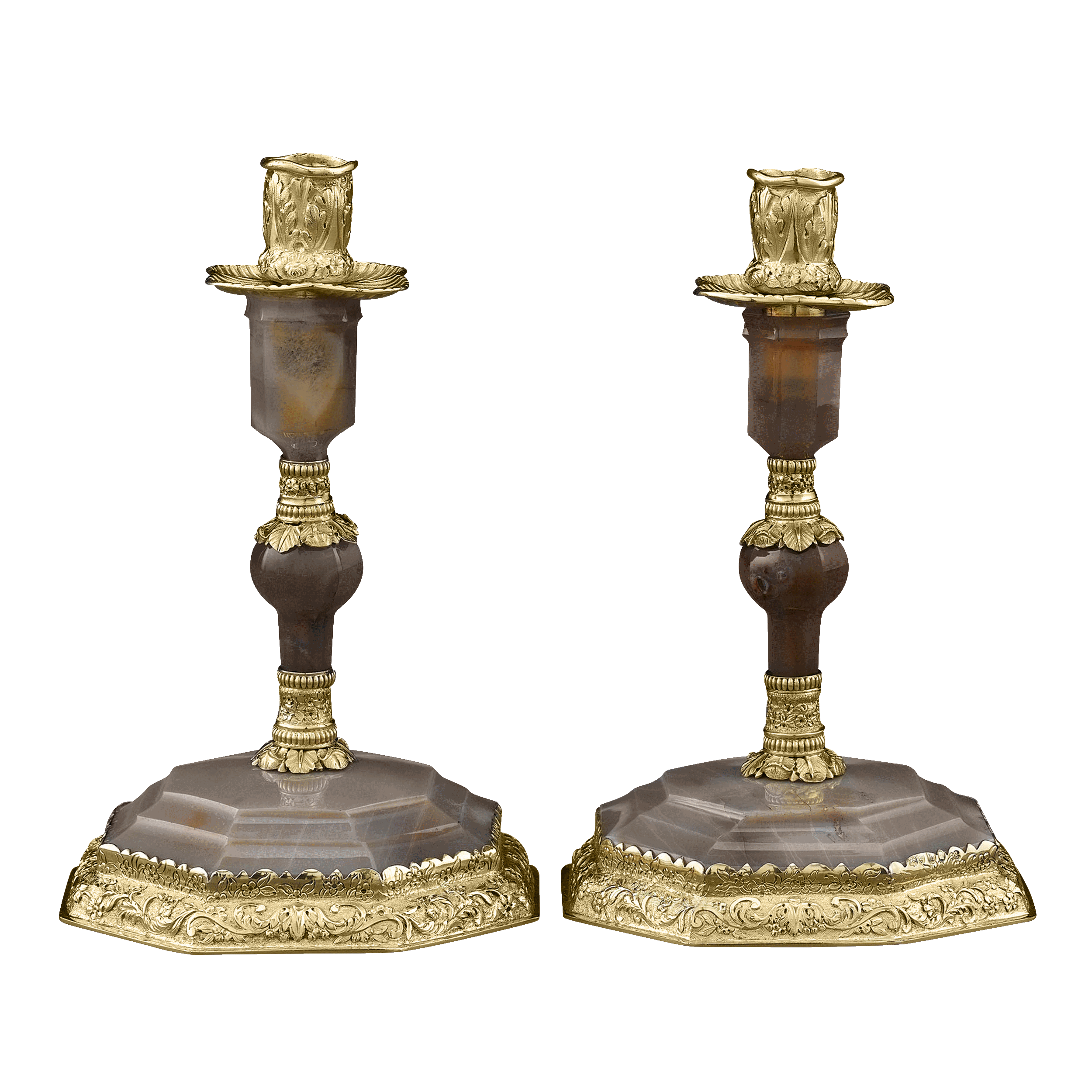 A spectacular pair of George IV candlesticks by renowned English silversmith Edward Farrell