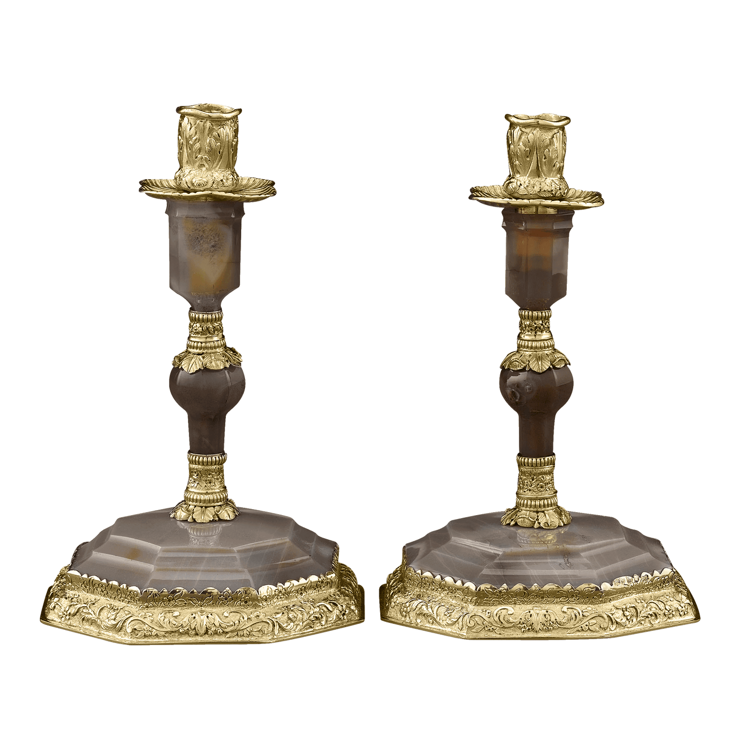 A spectacular pair of George IV candlesticks by renowned English silversmith Edward Farrell