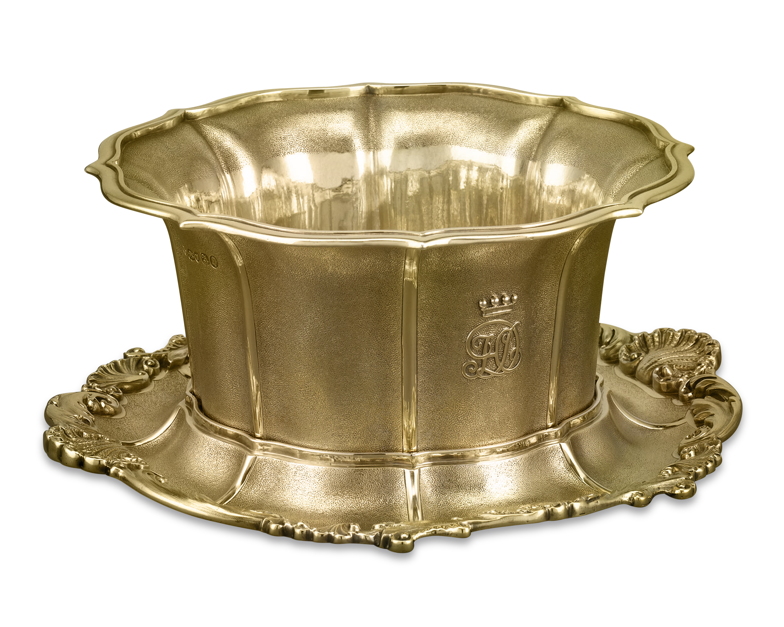 This elegant silver-gilt bowl features textured sides and intricate applied decoration