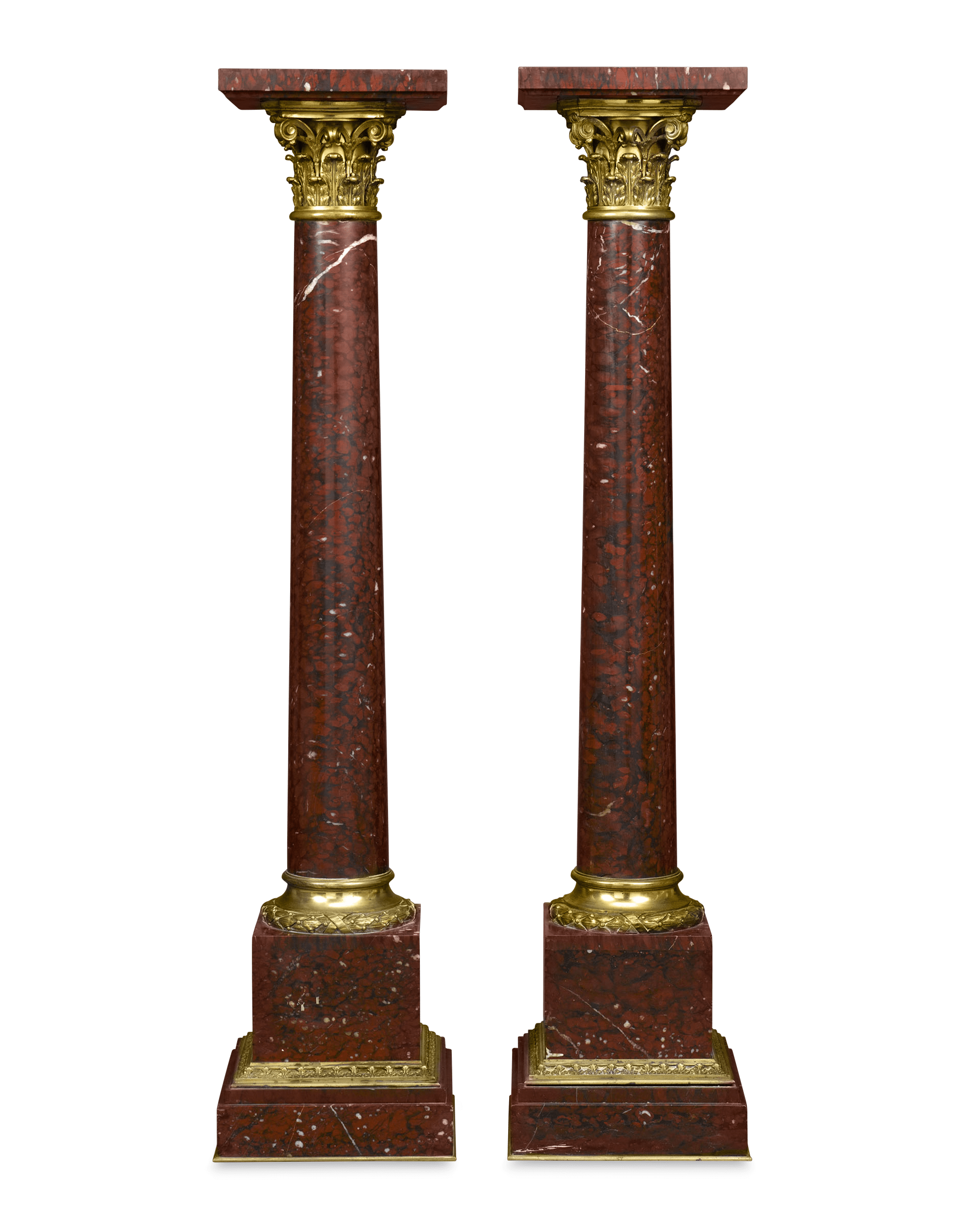 This exceptional pair of rouge marble pedestals make an elegant statement