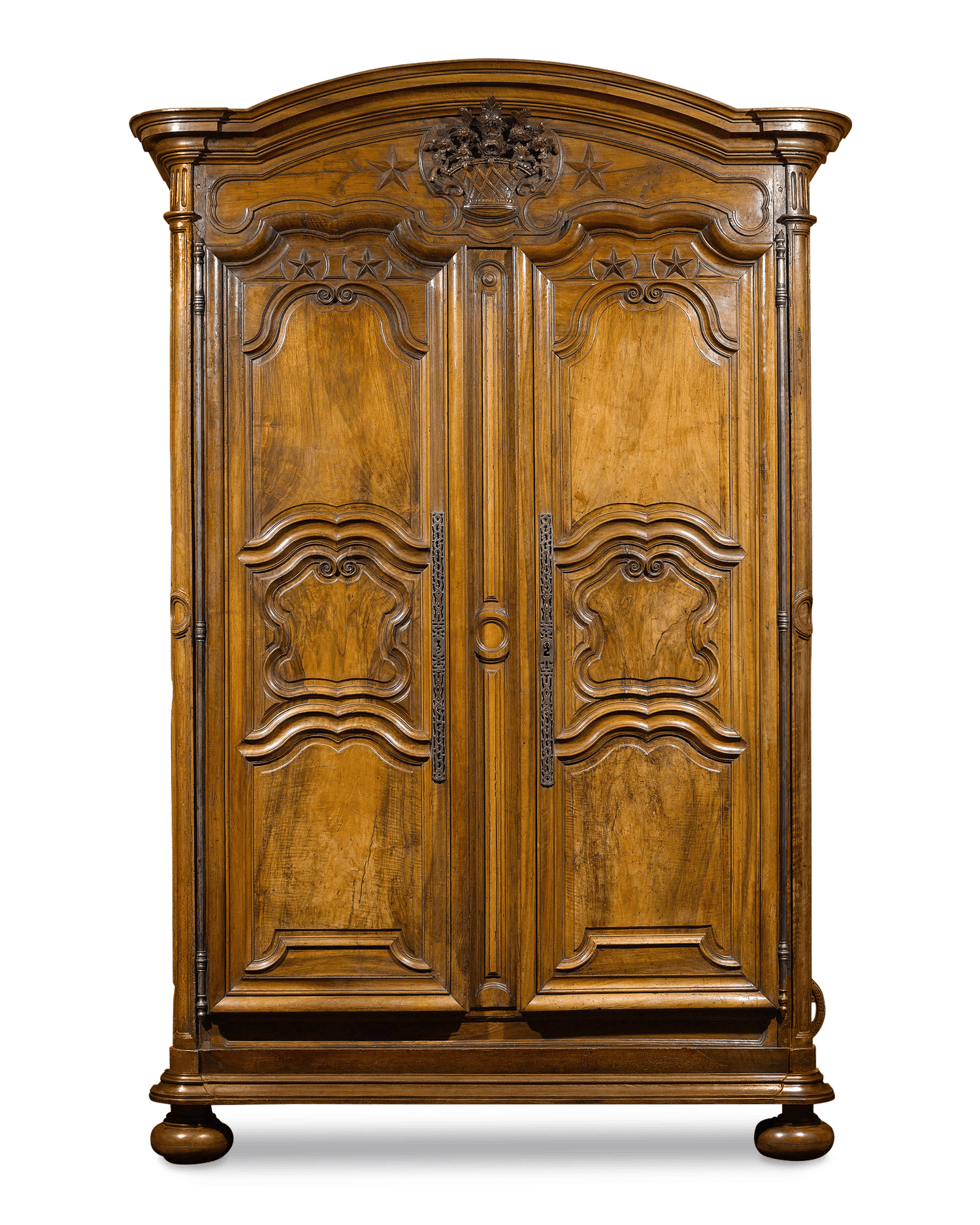 Exceptional carving distinguishes this rare French Provincial walnut armoire