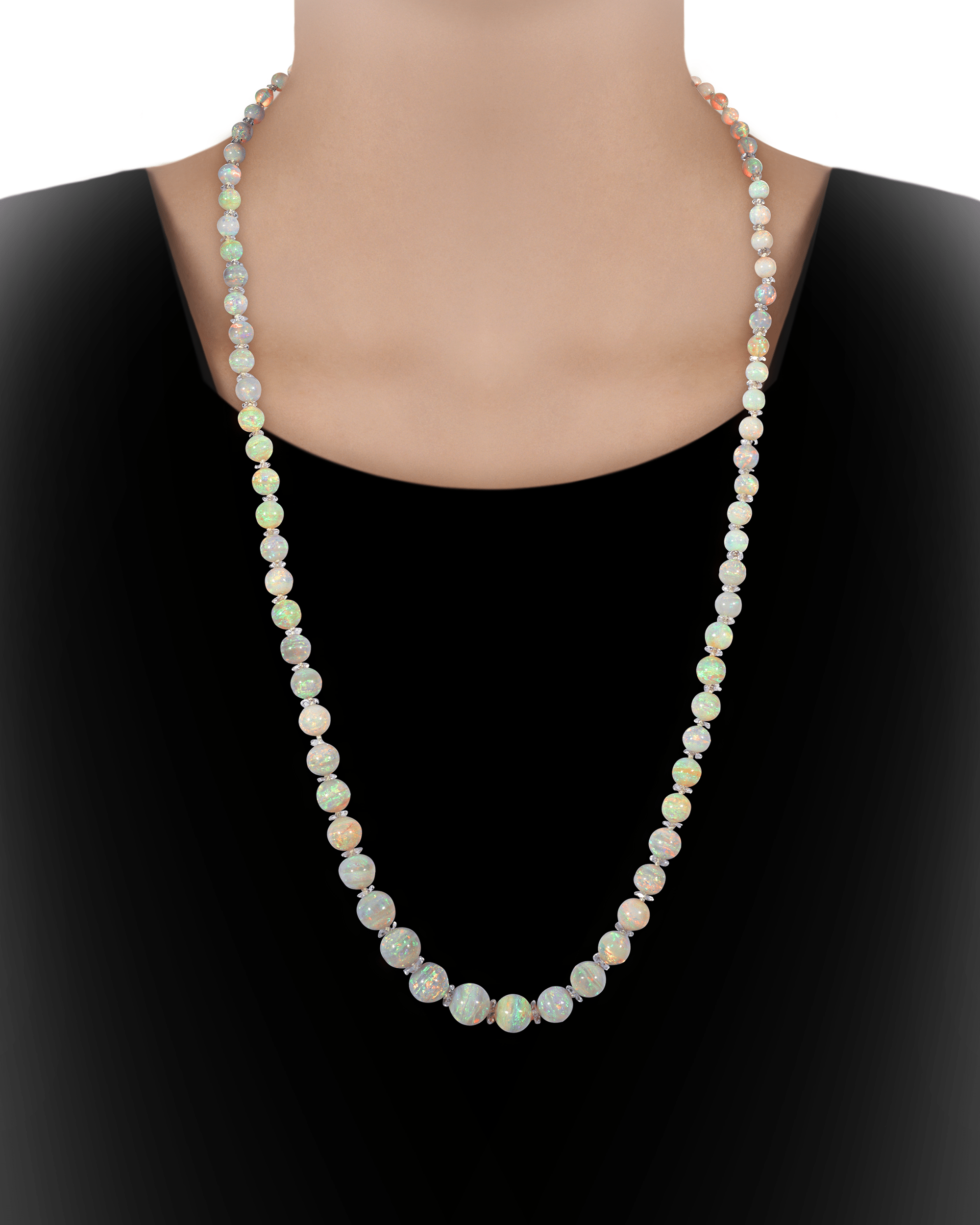Beautiful rock crystal rondelles separate each opal bead