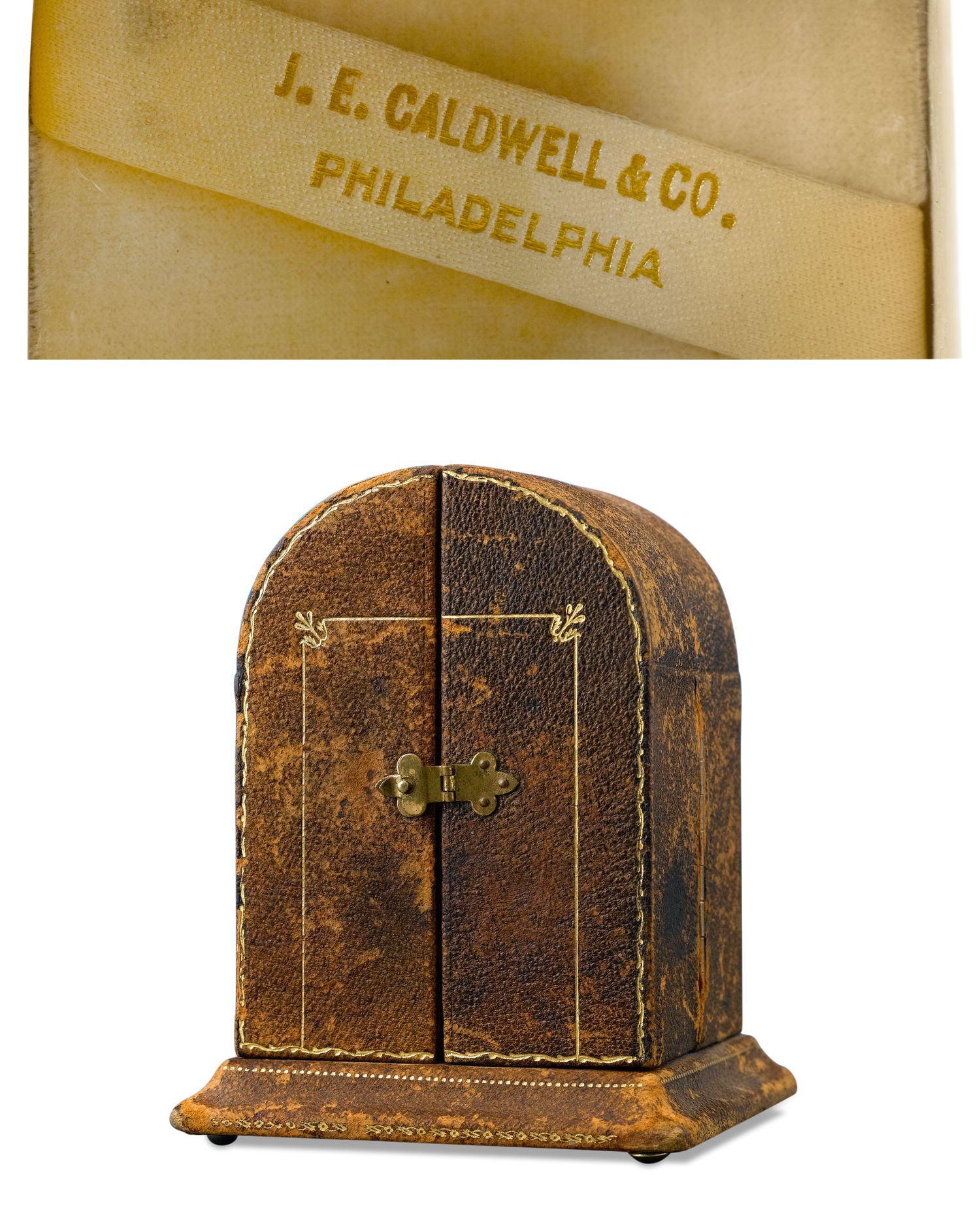 The clock is housed in its original, signed leather case