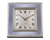 Soft blue guilloché enamel distinguishes this Art Deco-period Cartier desk clock