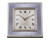 Soft blue guilloché enamel distinguishes this Art Deco-period Cartier desk clock