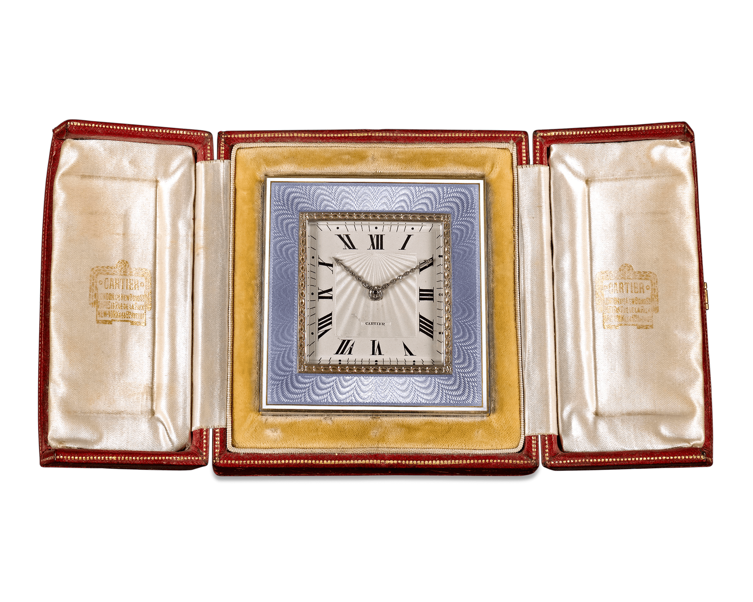 The clock can stand alone or be displayed in its original leather case