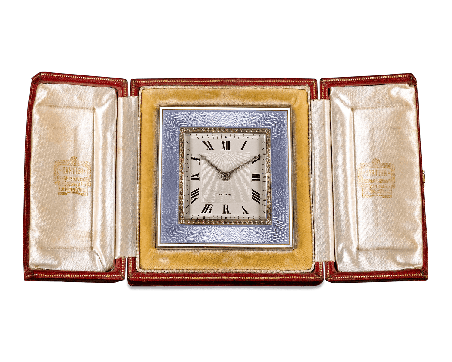 The clock can stand alone or be displayed in its original leather case