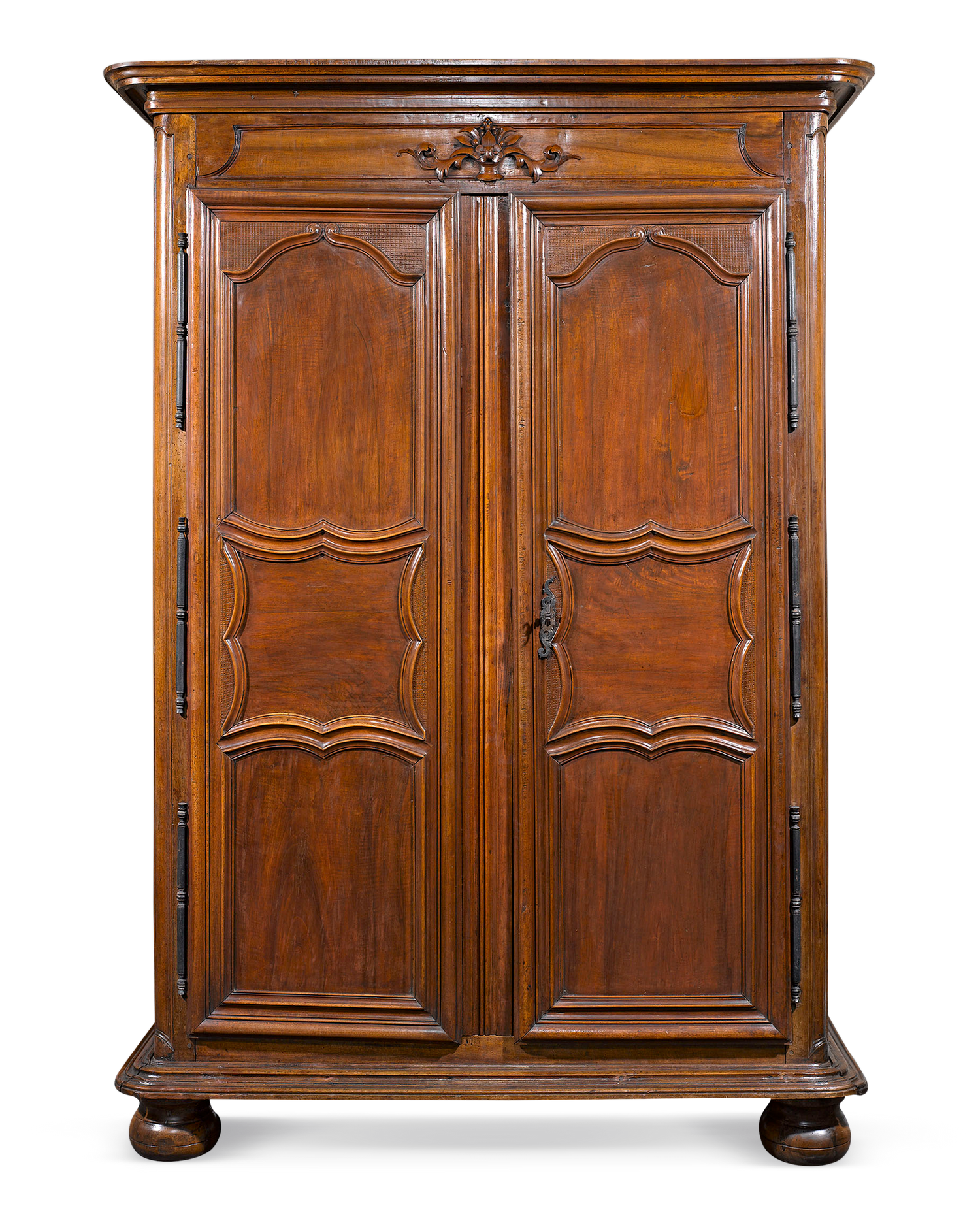 This elegant French armoire exemplifies the beauty of Provincial furnishings