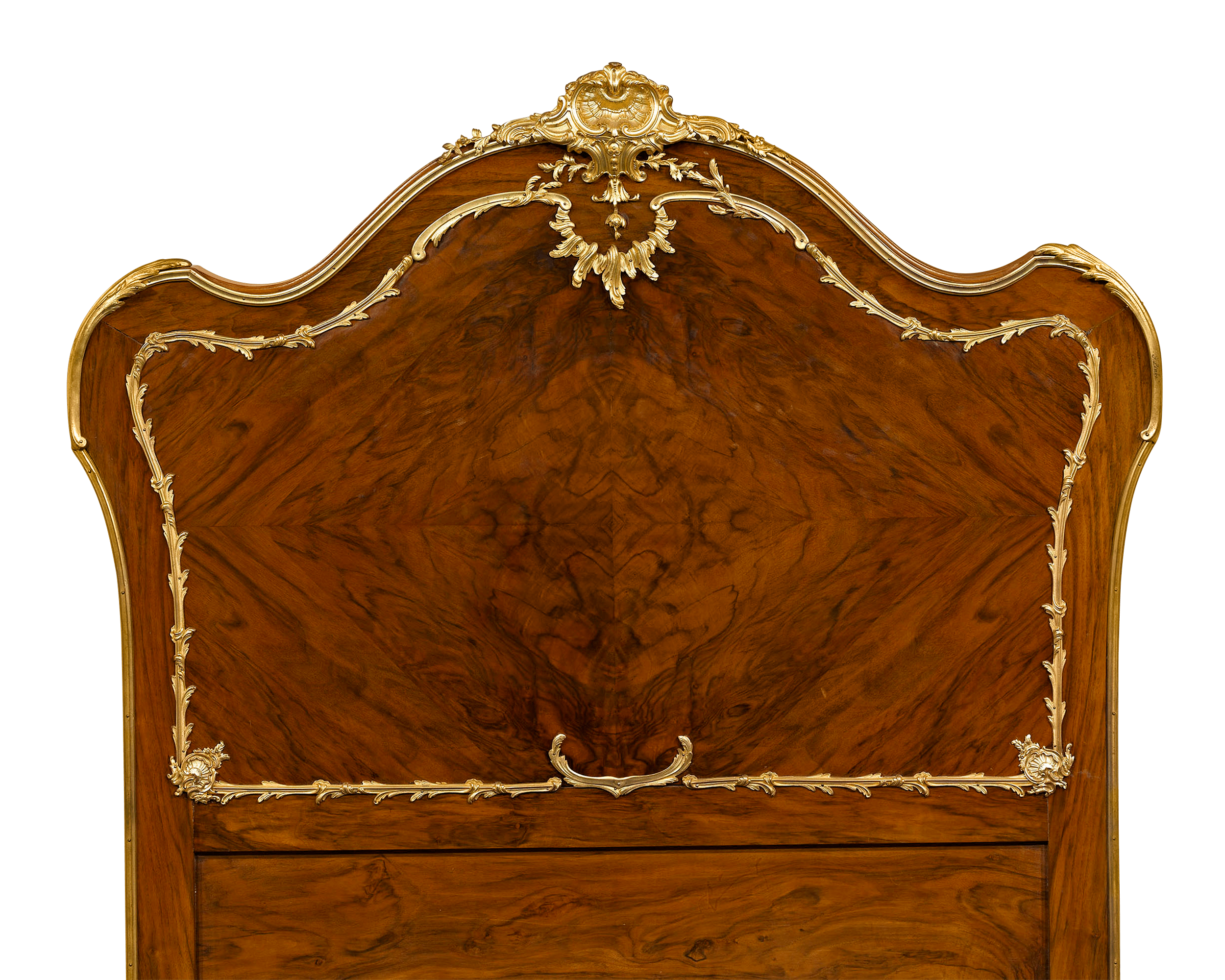 Elegant dore bronze contrasts beautifully with the mahogany