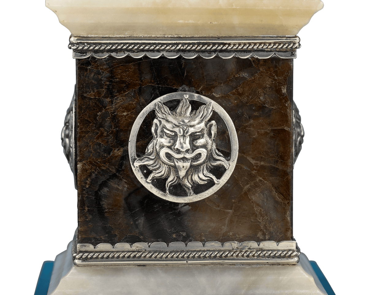 The exceptional piece is adorned with masterfully crafted silver mountings