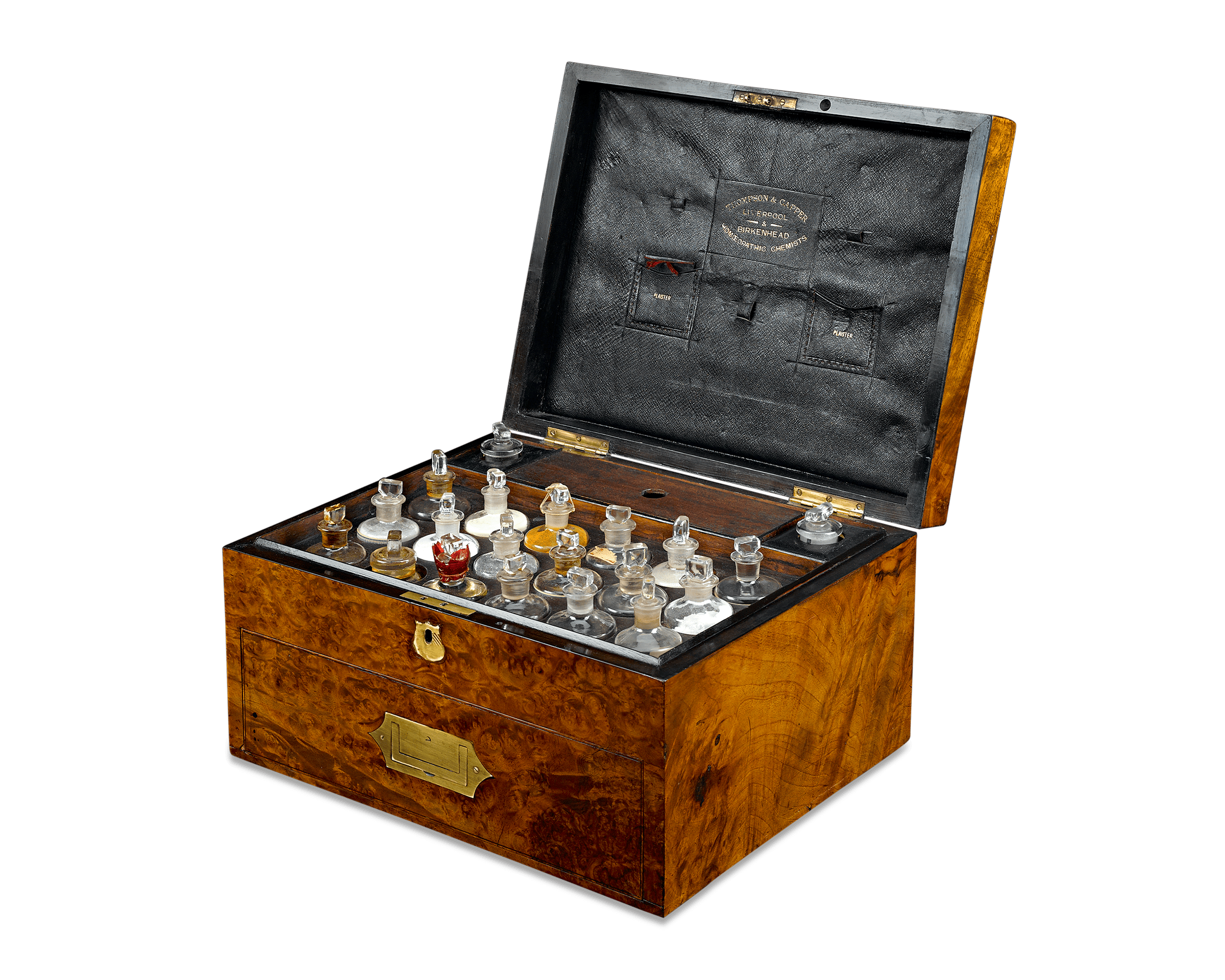 This particular case was created by Thompson & Capper, homeopathic chemists in northwestern England