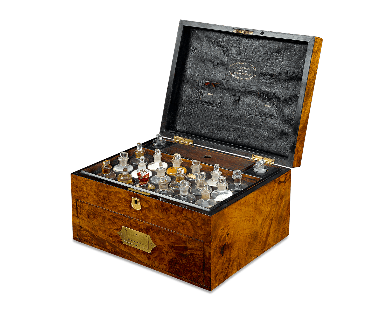This particular case was created by Thompson & Capper, homeopathic chemists in northwestern England